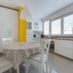 Fully equipped kitchen with dining table for 5 persons and big windows with lots of light.