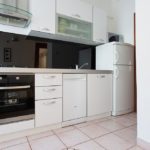 Fully equipped kitchen with stove, microwave, oven dish washer and fridge