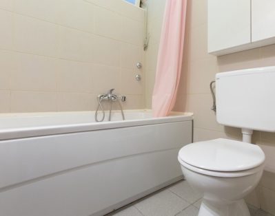 Bathroom with bath tub and window (natural light)