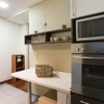 Fully equipped kitchen with big fridge, microwave dishwasher and oven
